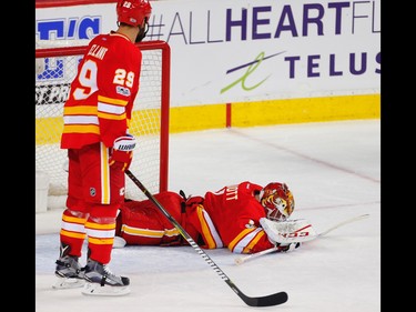 Calgary Flames Brian Elliott reacts after giving up a goal to the Anaheim Ducks during NHL hockey in Calgary, Alta., on Sunday, April 2, 2017. AL CHAREST/POSTMEDIA