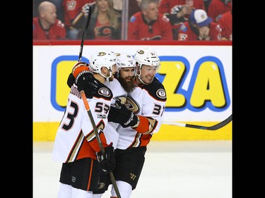 Ducks Shea Theodore (L) Patrick Eaves and Nick Ritchie celebrate the team's first goal during NHL playoff game 4 action between the Calgary Flames and Anaheim Ducks in Calgary, Alta on Wednesday April 19, 2017. Jim Wells/Postmedia