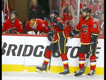 Flames watch a replay of the Ducks second goal during NHL playoff game 4 action between the Calgary Flames and Anaheim Ducks in Calgary, Alta on Wednesday April 19, 2017. Jim Wells/Postmedia