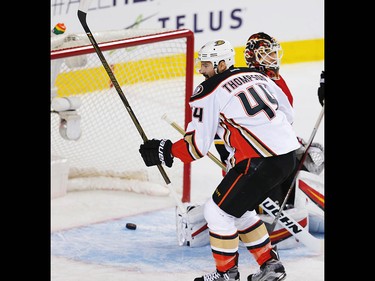 Anaheim Ducks Nate Thompson scores on Calgary Flames goalie Chad Johnson during the 2017 Stanley Cup playoffs in Calgary, Alta., on Wednesday, April 19, 2017. AL CHAREST/POSTMEDIA