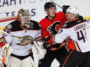 Calgary Flames Matthew Tkachuk collides with  Hampus Lindholm of the Anaheim Ducks during 2017 Stanley Cup playoffs in Calgary, Alta., on Wednesday, April 19, 2017.