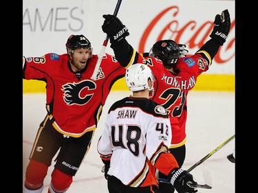 Calgary Flames Sean Monahan celebrates with teammates after scoring against the Anaheim Ducks during the 2017 Stanley Cup playoffs in Calgary, Alta., on Wednesday, April 19, 2017. AL CHAREST/POSTMEDIA