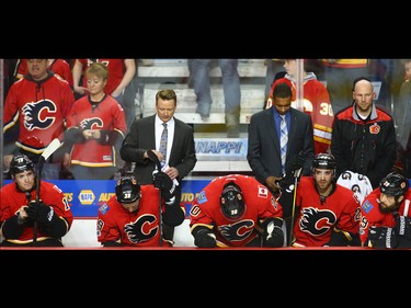 Flames bench looks down as the final whistle blows during NHL playoff game 4 action between the Calgary Flames and Anaheim Ducks in Calgary, Alta on Wednesday April 19, 2017. Anaheim won the game 3-1 and took the series 4-0. Jim Wells/Postmedia