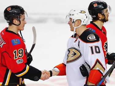 Calgary Flames Matthew Tkachuk and Anaheim Ducks Corey Perry during the hand shake after game 4 of the 2017 Stanley Cup playoffs in Calgary, Alta., on Wednesday, April 19, 2017. AL CHAREST/POSTMEDIA