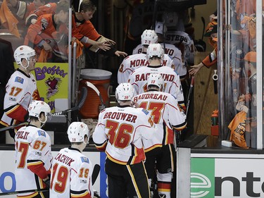 Calgary Flames players leave the ice after their team's 3-2 loss to the Anaheim Ducks in Game 1 of a first-round NHL hockey Stanley Cup playoff series Thursday, April 13, 2017, in Anaheim, Calif. (AP Photo/Jae C. Hong) ORG XMIT: CAJH120