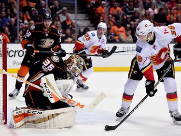 ANAHEIM, CA - APRIL 13:  John Gibson #36 of the Anaheim Ducks makes a save in front of Alex Chiasson #39 of the Calgary Flames during the second period of a 3-2 Ducks win in Game One of the Western Conference First Round during the 2017 NHL Stanley Cup Playoffs at Honda Center on April 13, 2017 in Anaheim, California.  (Photo by Harry How/Getty Images)