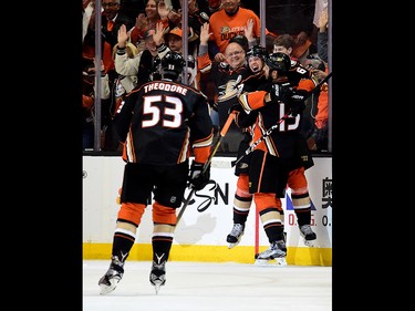 ANAHEIM, CA - APRIL 13:  Rickard Rakell #67 of the Anaheim Ducks celebrates his goal with Ryan Getzlaf #15 to tie the score 2-2 with the Calgary Flames during the second period in Game One of the Western Conference First Round during the 2017 NHL Stanley Cup Playoffs at Honda Center on April 13, 2017 in Anaheim, California.  (Photo by Harry How/Getty Images)