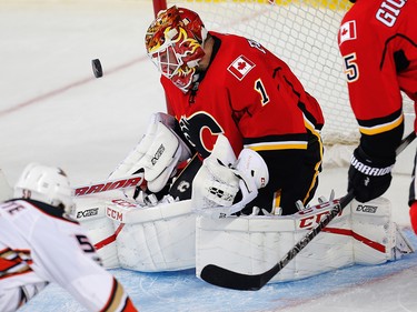 Calgary Flames Brian Elliott makes a save against the Anaheim Ducks during 2017 Stanley Cup playoffs in Calgary, Alta., on Monday, April 17, 2017. AL CHAREST/POSTMEDIA