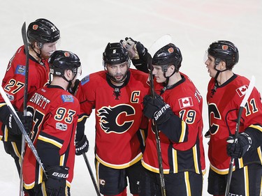 Calgary Flames Mark Giordano, third from left, celebrates his goal in second period on Anaheim Ducks during NHL playoff action at the Scotiabank Saddledome in Calgary, Alta. on Monday April 17, 2017. Leah Hennel/Postmedia