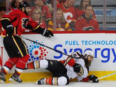 Calgary Flames Mark Giordano collides with Patrick Eaves of the Anaheim Ducks during 2017 Stanley Cup playoffs in Calgary, Alta., on Monday, April 17, 2017. AL CHAREST/POSTMEDIA