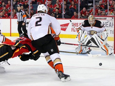 The Calgary Flames' Sam Bennett is corralled by the Anaheim Ducks' Korbinian Holzer and Kevin Bieksa as he tries to score on goaltender John Gibson late in the third period of game 3 of their Stanley Cup playoff series at the Scotiabank Saddledome on Monday April 17, 2017. Gavin Young/Postmedia Network