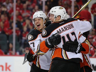 The Anaheim Ducks celebrate winning over time 5-4 to take game 3 against the Calgary Flames during their Stanley Cup playoff series at the Scotiabank Saddledome on Monday April 17, 2017. Gavin Young/Postmedia Network