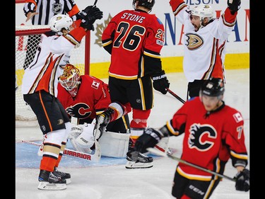 Calgary Flames goalie Brian Elliott reacts after giving up the OT winner to Corey Perry of Anaheim Ducks during the 2017 Stanley Cup playoffs in Calgary, Alta., on Monday, April 17, 2017. AL CHAREST/POSTMEDIA