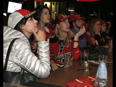 Calgary Flames fans reacts as the Ducks scored scored in OT to beat the Calgary Flames in game 3 at Trolley 5 Restaurant and Brewery on the Red Mile on Monday April 17, 2017. DARREN MAKOWICHUK/Postmedia Network