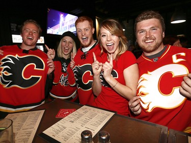 Calgary Flames fans get ready to cheer on their team at Trolley 5 on the Red Mile on Saturday April 15, 2017. DARREN MAKOWICHUK/Postmedia Network