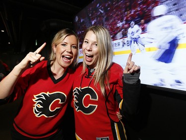 Calgary Flames fans get ready to cheer on their team at Trolley 5 on the Red Mile on Saturday April 15, 2017. DARREN MAKOWICHUK/Postmedia Network