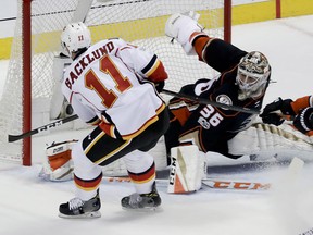 Calgary Flames center Mikael Backlund scores past Anaheim Ducks goalie John Gibson during the first period in Game 2 of a first-round NHL hockey Stanley Cup playoff series in Anaheim, Calif., Saturday, April 15, 2017. (AP Photo/Chris Carlson) ORG XMIT: ANA102
