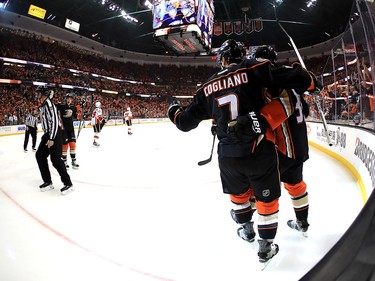 ANAHEIM, CA - APRIL 15:  Andrew Cogliano #7 and Jakob Silfverberg #33 of the Anaheim Ducks celebrate a goal during the first period of Game Two of the Western Conference acFirst Round during the 2017 NHL Stanley Cup Playoffs against the Calgary Flames at Honda Center on April 15, 2017 in Anaheim, California.  (Photo by Sean M. Haffey/Getty Images)