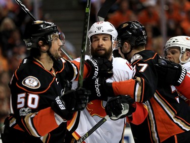 ANAHEIM, CA - APRIL 15:  Nick Ritchie #37 and Antoine Vermette #50 of the Anaheim Ducks push against Alex Chiasson #39 of the Calgary Flames during the first period of Game Two of the Western Conference First Round during the 2017 NHL Stanley Cup Playoffs at Honda Center on April 15, 2017 in Anaheim, California.  (Photo by Sean M. Haffey/Getty Images)