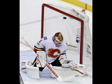 Calgary Flames goalie Brian Elliott gives up a goal to Anaheim Ducks left wing Jakob Silfverberg during the first period in Game 2 of a first-round NHL hockey Stanley Cup playoff series in Anaheim, Calif., Saturday, April 15, 2017. (AP Photo/Chris Carlson) ORG XMIT: ANA114