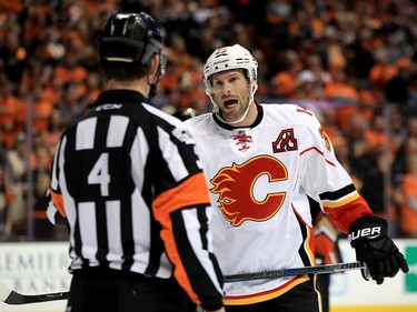 ANAHEIM, CA - APRIL 15:  Troy Brouwer #36 of the Calgary Flames talks with referee Wes McCauley during the second period of Game Two of the Western Conference First Round against the Anaheim Ducks during the 2017 NHL Stanley Cup Playoffs at Honda Center on April 15, 2017 in Anaheim, California.  (Photo by Sean M. Haffey/Getty Images)