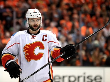 ANAHEIM, CA - APRIL 15:  Mark Giordano #5 of the Calgary Flames looks on during the third period of Game Two of the Western Conference First Round against the Anaheim Ducks during the 2017 NHL Stanley Cup Playoffs at Honda Center on April 15, 2017 in Anaheim, California.  (Photo by Sean M. Haffey/Getty Images)
