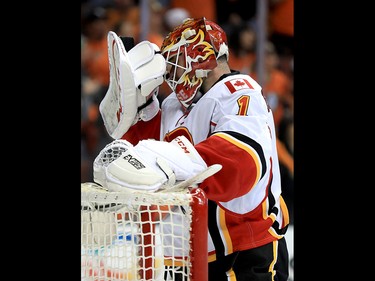 ANAHEIM, CA - APRIL 15:  Brian Elliott #1 of the Calgary Flames holds his head after Ryan Getzlaf #15 of the Anaheim Ducks scored a goal during the third period of Game Two of the Western Conference First Round during the 2017 NHL Stanley Cup Playoffs at Honda Center on April 15, 2017 in Anaheim, California.  (Photo by Sean M. Haffey/Getty Images)