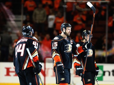 Nate Thompson #44, and Ryan Getzlaf #15 of the Anaheim Ducks look on after defeating the Calgary Flames 3-2 during Game 2 of the Western Conference First Round during the 2017 NHL Stanley Cup Playoffs at Honda Center on April 15, 2017 in Anaheim, Calif.