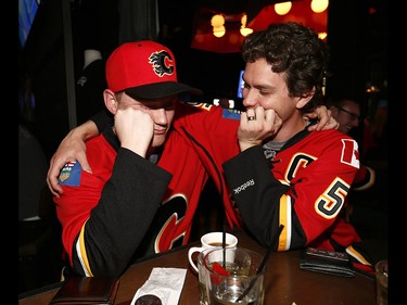 Calgary Flames fans react as the Ducks scored the go ahead goal to make it 3-2 against the Calgary Flames in the third period at Trolley 5 Restaurant and Brewery on the Red Mile on Saturday April 15, 2017. DARREN MAKOWICHUK/Postmedia Network