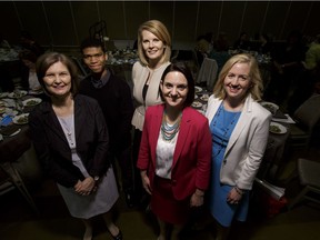 (L-R) Bonnie Johnston, CEO of the Sheldon Kennedy Child Advocacy Centre; Tobey Bedell, a youth representative from Big Brothers and Big Sisters of Calgary; Tara Nelson of CTV; Minister of Children's Services Danielle Larivee; and Sara Austin, founder and CEO of Children First Canada, mug for a photo before being part of Children First Canada's 'The Kids are Not Alright' panel discussion at the Westin hotel in downtown Calgary, Alta., on Wednesday, April 5, 2017. The panel luncheon was a joint effort with the Economic Club of Canada aiming to spark action to improve the lives of impoverished kids in Canada. Lyle Aspinall/Postmedia Network