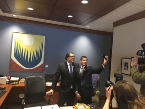 Haaziq Altaf, a grade 10 student from Crescent Heights School takes a selfie with Mayor Naheed Nenshi in he mayor's office on Wednesday April 26, 2017.