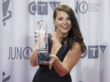 Jess Moskaluke poses with a Juno award after winning the Country Album of the Year award at the Juno awards show Sunday April 2, 2017 in Ottawa.
