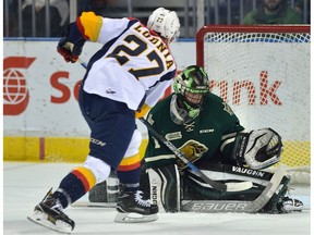 London Knights goaltender Tyler Parsons stops Erie forward Ivan Lodnia on a breakaway in the first period of game three of their playoff series at Budweiser Gardens in London, Ontario on Tuesday April 11, 2017.
