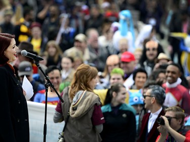 Emily Expo speaks to the massive crowd at Olympic Plaza. The Calgary Comic and Entertainment Expo kicked things off with the Parade of Wonders in downtown Calgary, Alta., on April 28, 2017. Thousands marched and lined the streets to watch the parade filled with nerds of all genres and styles, from comic books to television and board games, it was all on display. Ryan McLeod/Postmedia Network