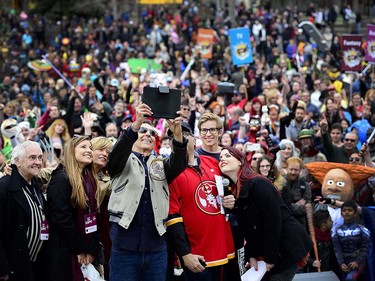 Todd McFarlane along with his family, Mayor Nenshi and Emily Expo pose for a selfie with the massive crowd at Olympic Plaza. The Calgary Comic and Entertainment Expo kicked things off with the Parade of Wonders in downtown Calgary, Alta., on April 28, 2017. Thousands marched and lined the streets to watch the parade filled with nerds of all genres and styles, from comic books to television and board games, it was all on display. Ryan McLeod/Postmedia Network