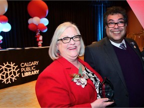 Patricia Johnson received the John Dutton Volunteer of the Year award from Mayor Naheed Nenshi during the 43rd Calgary Public Library Volunteer Recognition at the John Dutton Theatre in Calgary, Alta., on April 21, 2017. Ryan McLeod/Postmedia Network