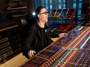 Evangelos Lambrinoudis II checks out the rare Trident A Range console at the National Music Centre at Studio Bell. He begins his artist-in-residence stint this week.