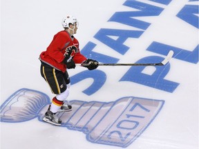 Matthew Tkachuk skates over the Stanley Cup logo during practise at the Scotiabank Saddledome earlier this week. Reader says the team deserves Calgarians' support.