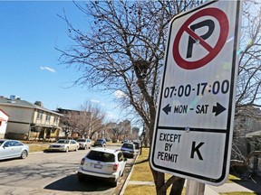 A residential parking permit sign in Kensington was photographed on Sunday April 16, 2017.  City council will consider this week a strategy that would allow photo enforcement and electronic permitting for parking in residential neighbourhoods.