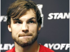 Calgary Flames Michael Frolik speaks to reporters during NHL practice at the Scotiabank Saddledome in Calgary, Alta., on Tuesday, April 18, 2017.