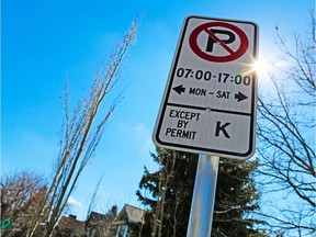 A residential parking permit sign in Kensington was photographed on Sunday April 16, 2017.  City council will consider this week a strategy that would allow photo enforcement and electronic permitting for parking in residential neighbourhoods.