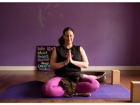 Yoga instructor Johanna Steinfeld demonstrates how you can centre yourself with a few moments of quiet introspective breathing for her April 2017 yoga column. Gavin Young/Postmedia Network