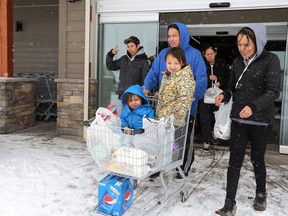 Blood Reserve band members leave after shopping in the new Kanai Marketplace grocery store in Standoff. The store allows those on the reserve to shop for fresh fruit vegetables and all other groceries without having to travel to Cardston or Fort Macleod.