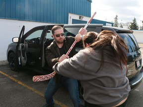 Crime Stoppers re-enact a violent road rage incident outside the Mt. Pleasant Sportspex on Monday, April 10, 2017. The original event occurred in December 2016 outside the arena when a woman was assaulted while her nine year-old daughter watched.