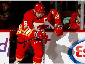 Mark Giordano of the Calgary Flames hits the ice agains the Anaheim Ducks during NHL action in Calgary, Alta., on Sunday, April 2, 2017. Lyle Aspinall/Postmedia Network