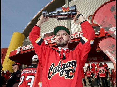 Flames fan Billy Feculak, who lives in Edmonton, Alta and drove to Calgary, shows his pride before NHL playoff game 4 action between the Calgary Flames and Anaheim Ducks in Calgary, Alta on Wednesday April 19, 2017. Jim Wells//Postmedia