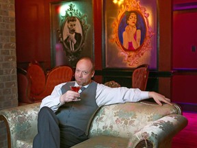 Blaine Armstrong enjoying a cocktail in Betty Lou's Library.