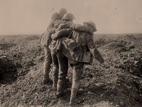 Wounded soldiers are brought in for care during the taking of Vimy Ridge in 1917.