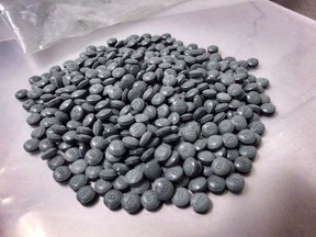 Fentanyl pills are shown in an undated police handout photo. Police and Alberta health officials are raising the alarm about a dangerous drug called W-18 that is much more toxic than fentanyl, another opioid that has been linked to hundreds of deaths in Canada. THE CANADIAN PRESS/HO - Alberta Law Enforcement Response Teams (ALERT) ORG XMIT: CPT112 ORG XMIT: POS1608111622362392