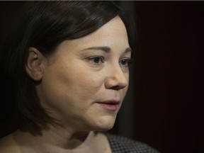 Shannon Phillips, Minister of Environment and Parks and Minister Responsible for the Climate Change Office, speaks to the media at the Alberta Energy Efficiency Alliance Conference, at the Matrix Hotel, 10640 100 Ave., in Edmonton Tuesday Jan. 17, 2017. Photo by David Bloom